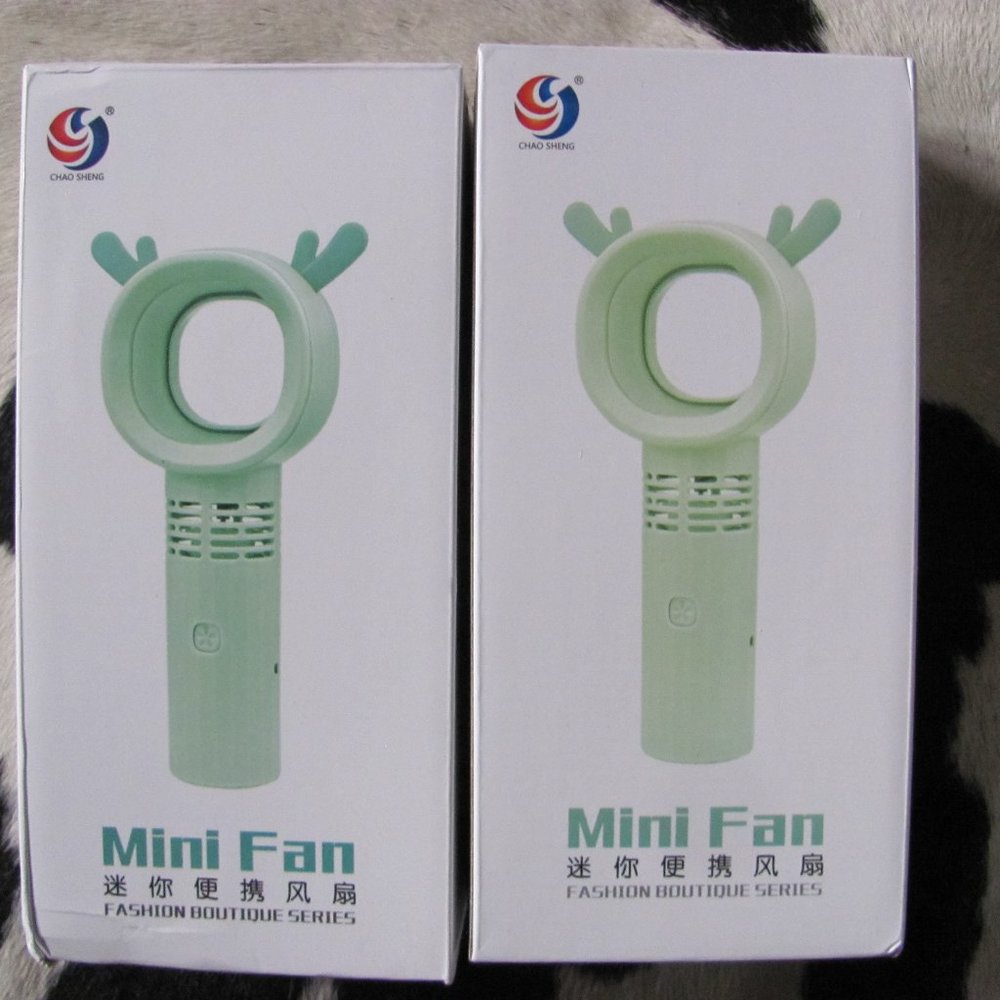RECHARGABLE HAND HELD FANS NIB
